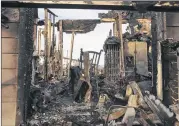  ?? JIM WILSON / THE NEW YORK TIMES ?? A burned home in the Rancho Monserate Country Club shows the devastatio­n caused by the Lilac Fire in Fallbrook, Calif., Saturday. “This is very odd and unusual,” Gov. Jerry Brown said.