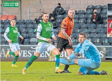  ??  ?? Martin Boyle fires home Hibs’ second goal to secure the three points