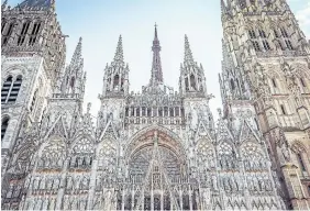  ?? DREAMSTIME ?? A sensationa­l summer light and sound show happens at Rouen Cathedral in Rouen, France.