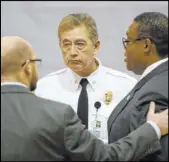  ?? Elizabeth Page Brumley Las Vegas Review-Journal ?? Las Vegas City Ward 1 councilman Brian Knudsen, left, Las Vegas Fire Marshal Robert Nolan, center, and Ward 5 councilman Cedric Crear speak before a news conference on Dec. 23.