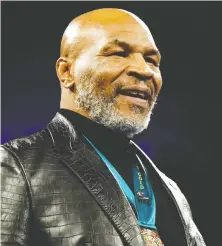  ?? STEVE MARCUS/ REUTERS FILES ?? Former heavyweigh­t champion Mike Tyson, who hasn't fought in a profession­al boxing match in 15 years, will face Roy Jones Jr. on Saturday at the age of 54 in an exhibition match.