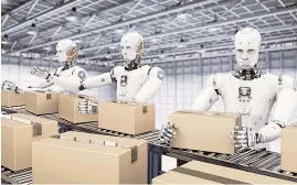  ??  ?? Firms use automated transporte­rs to move packages without a human forklift driver