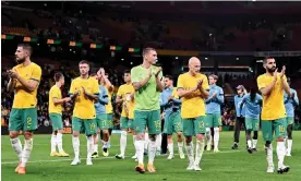  ?? Photograph: Bradley Kanaris/Getty Images ?? Members of the Socceroos squad celebrate last week’s 1-0 friendly win over New Zealand in Brisbane.