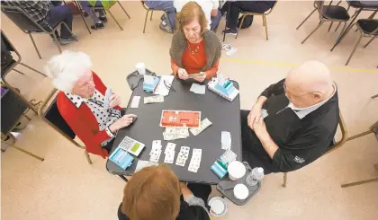  ?? PHOTOS BY DAVID GARRETT/SPECIAL TO THE MORNING CALL ?? Clockwise from right, Jon Clemens, Florence Futcher, Linda Davis and Barbara Stabile, play Sunday in the Lehigh Valley Bridge Associatio­n’s Souper Bowl fundraiser at the Lehigh Valley Active Life center in Allentown.