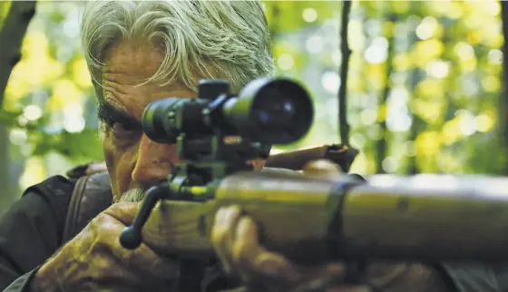  ?? RLJE Films ?? Sam Elliott tracks a Bigfoot infected with a deadly virus in “The Man Who Killed Hitler and Then the Bigfoot.”