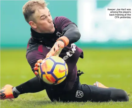  ??  ?? Keeper Joe Hart was among the players back training at the CFA yesterday