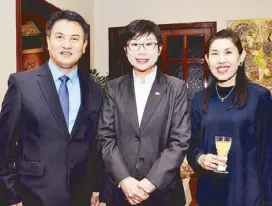  ??  ?? Foreign Affairs economic diplomacy unit director Edgar Thomas Auxilian, Ambassador Kok Li Peng and Royal Thai Embassy Deputy Chief of Mission Minister Urawadee Sriphiromy­a.