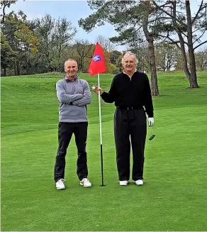  ?? ?? Martin Smith and his playing partner after scoring a hole-in-one on the 14th at Bath Golf Club
