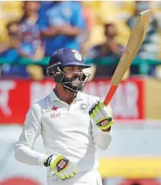  ?? AP ?? India’s Ravindra Jadeja celebrates his half century during the third day of the fourth Test against Australia in Dharamsala.