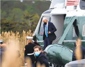  ?? SAUL LOEB AFP VIA GETTY IMAGES ?? President Joe Biden arrives in Rehoboth Beach, Del., on Monday. Biden has signed a $770 billion defense bill that includes billions for the procuremen­t of advanced aircraft, ships and high-tech hardware.