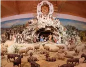  ?? — AFP ?? One of the world’s largest nativity scene with 778 figures in a huge cabinet seen in the Austrian village of “Christ Child” . The Austrian village of Christkind­l is a famed Steyr pilgrimage place popular during Christmas.