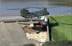  ??  ?? DRAMATIC: This reservoir was reinforced after its partial collapse