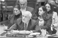  ??  ?? Photo shows Mansour addressing the Security Council meeting on the situation in the Middle East, including the Palestinia­n question at the UN in New York. — AFP photo