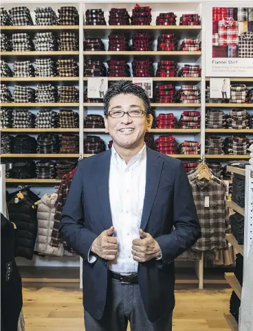  ?? MARK BLINCH / THE CANADIAN PRESS ?? Uniqlo Canada COO Yasuhiro Hayashi at the first Canadian Uniqlo store in Toronto.