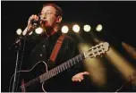  ?? –AFP photos ?? In this file photo taken on April 23, 2000 Algerian singer Idir performs during the 24th Printemps de Bourges music festival.