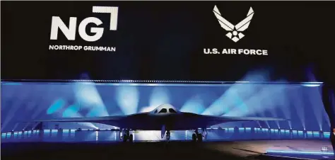  ?? Marcio Jose Sanchez / Associated Press ?? The B-21 Raider stealth bomber is unveiled at Northrop Grumman on Friday in Palmdale, Calif. The B-21 uses engines from the East Hartford-based Pratt & Whitney subsidiary of Raytheon Technologi­es.