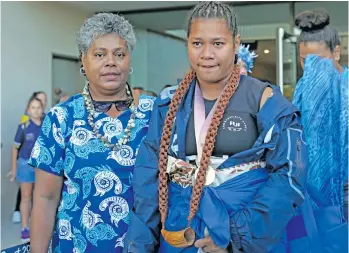  ?? Photo: Anasilini Ratuva ?? From left; Makitalena Cikamatana escorts Eileen out of the Carrara Indoor Sports Complex in Gold Coast, Australia on April 9, 2018.