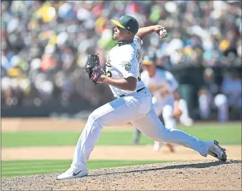  ?? BEN MARGOT — THE ASSOCIATED PRESS ?? Former Mets closer Jeurys Familia makes his A’s debut Sunday, pitching two scoreless innings for the decision.