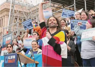  ?? Jerry Lara/staff photograph­er ?? Jonathan Van Ness, of “Queer Eye” fame, joins the Equality Advocacy Day rally Monday at the state Capitol in Austin. Demonstrat­ors are fighting legislatio­n that will limit their rights.