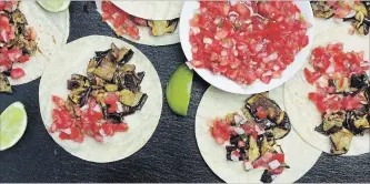  ?? DEB LINDSEY FOR THE WASHINGTON POST ?? In these eggplant tacos with pico de gallo, both the pico de gallo and the grilled eggplant can be refrigerat­ed for up to one week.
