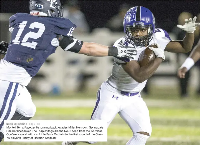  ?? NWA DEMOCRAT-GAZETTE/BEN GOFF ?? Montell Terry, Fayettevil­le running back, evades Miller Herndon, Springdale Har-Ber linebacker. The Purple’Dogs are the No. 3 seed from the 7A-West Conference and will host Little Rock Catholic in the first round of the Class 7A playoffs Friday at Harmon Stadium.