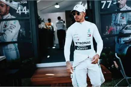  ??  ?? CHAMPION... Lewis Hamilton of Mercedes GP has recently made history in Formula 1