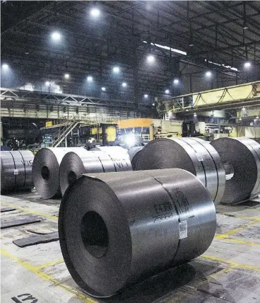  ?? TARA WALTON / THE CANADIAN PRESS FILES ?? Rolls of coiled steel at Canadian steel producer Dofasco in Hamilton. Chapter 19 has been of no use against the latest U.S. tariffs of Canadian steel.