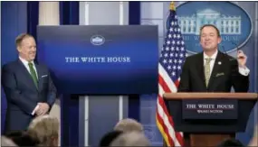  ?? THE ASSOCIATED PRESS ?? Budget Director Mick Mulvaney, joined by White House press secretary Sean Spicer, left, speaks about President Donald Trump’s budget proposal for the coming fiscal year during the daily press briefing Thursday at the White House.