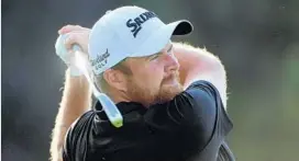  ?? ROSS KINNAIRD/GETTY IMAGES ?? Shane Lowry overcame a penalty early in his long day and finished ahead by two shots in the U.S. Open. The Irishman still has four holes remaining to finish his third round.