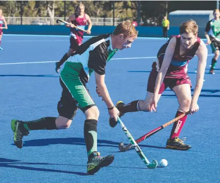  ?? Picture: MIKE BATTERHAM ?? Kingscliff’s Mitch Caifer on the charge against Mudgeeraba’s James McNeilage at Keith Hunt Park.