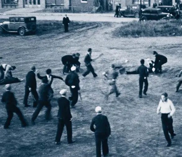  ??  ?? Rioters carrying sticks and throwing rocks run towards a police officer who is bending over a person on the ground during the Dominion Day riot in Regina in 1935. The violence began when police stormed a rally to arrest leaders of the On to Ottawa Trek.