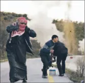  ??  ?? OPPOSITION FIGHTERS detonate a homemade device to disrupt access on a road in their part of Idlib, which borders Turkey in northern Syria.