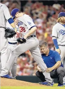  ?? Jeff Roberson Associated Press ?? DODGERS STARTER Brandon McCarthy left in the seventh inning Friday with what appeared to be a cramp in his leg.