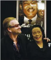  ?? ASSOCIATED PRESS ARCHIVES ?? U2’s Bono, left, who wrote the MLK song “Pride (In the Name of Love),” was honored for his humanitari­an work by King’s widow, Coretta Scott King, in 2004.