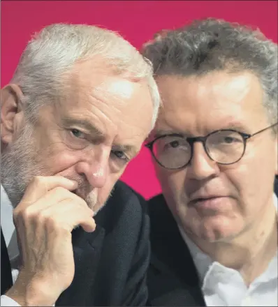  ?? PICTURE: PA WIRE. ?? BRACED FOR DEBATE: Labour leader Jeremy Corbyn and deputy leader Tom Watson at the start of Labour’s annual conference.