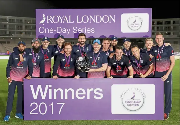  ?? — AP ?? Impressive run: England team celebratin­g with the trophy after the fifth one-day internatio­nal match against the West Indies on Friday.