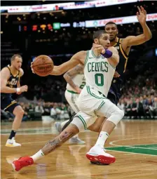  ?? STuART CAHILL / HERALd sTAFF FILE ?? HAS THE OFFENSE: Jayson Tatum averaged a team-high 23.4 points per game in the regular season.