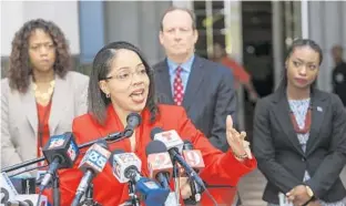  ?? JACOB LANGSTON/STAFF PHOTOGRAPH­ER ?? Orange-Osceola State Attorney Aramis Ayala announces her decision to pull back from her ban on pursuing the death penalty in cases during a press conference Friday at the Orange County Courthouse.