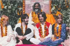  ?? SUNRISE FILMS ?? Beatles members Paul McCartney, centre left, and George Harrison spent time with the Maharishi Mahesh Yogi in India.