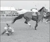  ?? John McDonnell Associated Press ?? JOHN VELAZQUEZ falls off Bodexpress out of the starting gate. The horse ran the race without a rider.