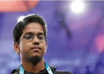  ?? AP Photo/Alex Brandon ?? left Shourav Dasari, 14, from Spring, Texas, pauses before spelling his word Thursday during the 90th Scripps National Spelling Bee.