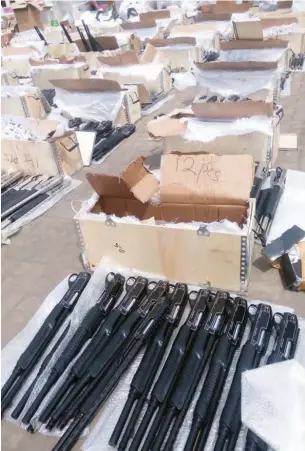  ??  ?? The Federal Operations Unit (FOU) of the Nigeria Customs Service (NCS) intercepte­d 661 pump-action rifles from China concealed with steel doors and other goods, which came in through Lagos port in January NAN