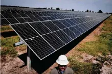  ?? Jon Shapley/staff photograph­er ?? Site Manager Danny Lynch works at a solar array operated by Enel near Iola. Many battery operators are opposing regulation­s proposed by the Electric Reliabilit­y Council of Texas.