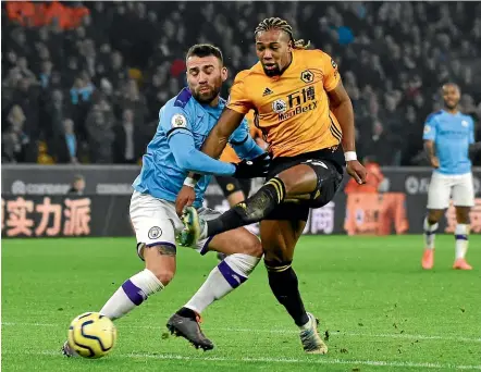  ?? AP ?? Wolves striker Adama Traore shoots against Manchester City yesterday.