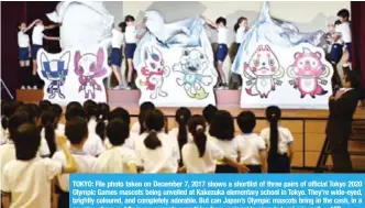  ??  ?? TOKYO: File photo taken on December 7, 2017 shows a shortlist of three pairs of official Tokyo 2020 Olympic Games mascots being unveiled at Kakezuka elementary school in Tokyo. They’re wide-eyed, brightly coloured, and completely adorable. But can...