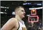  ?? JED JACOBSOHN — THE ASSOCIATED PRESS ?? Denver Nuggets center Nikola Jokic walks off the court after the team’s loss in Game 5of an NBA basketball first-round playoff series against the Golden State Warriors.