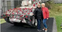  ??  ?? Council placemakin­g team members Betty Connolly, left, and Lianne van den Bemd with the Scorpion tank outside the National Army Museum at Waiouru.