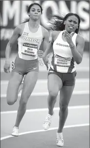  ?? NWA Democrat-Gazette/ANDY SHUPE ?? Chrishuna Williams (right) qualified for the Olympics with a personal-best 1 minute, 59.59 seconds in the 800 meters in Eugene, Ore. Williams was a 10-time All-American at Arkansas.