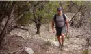  ?? Katie Hayes Luke/The Guardian ?? Dr Peter Attia walking near Austin, Texas. He practises archery and walks three miles every day. Photograph: