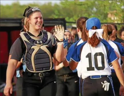  ?? COLEEN MOSKOWITZ — THE NEWS-HERALD ?? South coach Erin Dodson says catcher Kristen Jesberger “is our glue. She is our leader.”
